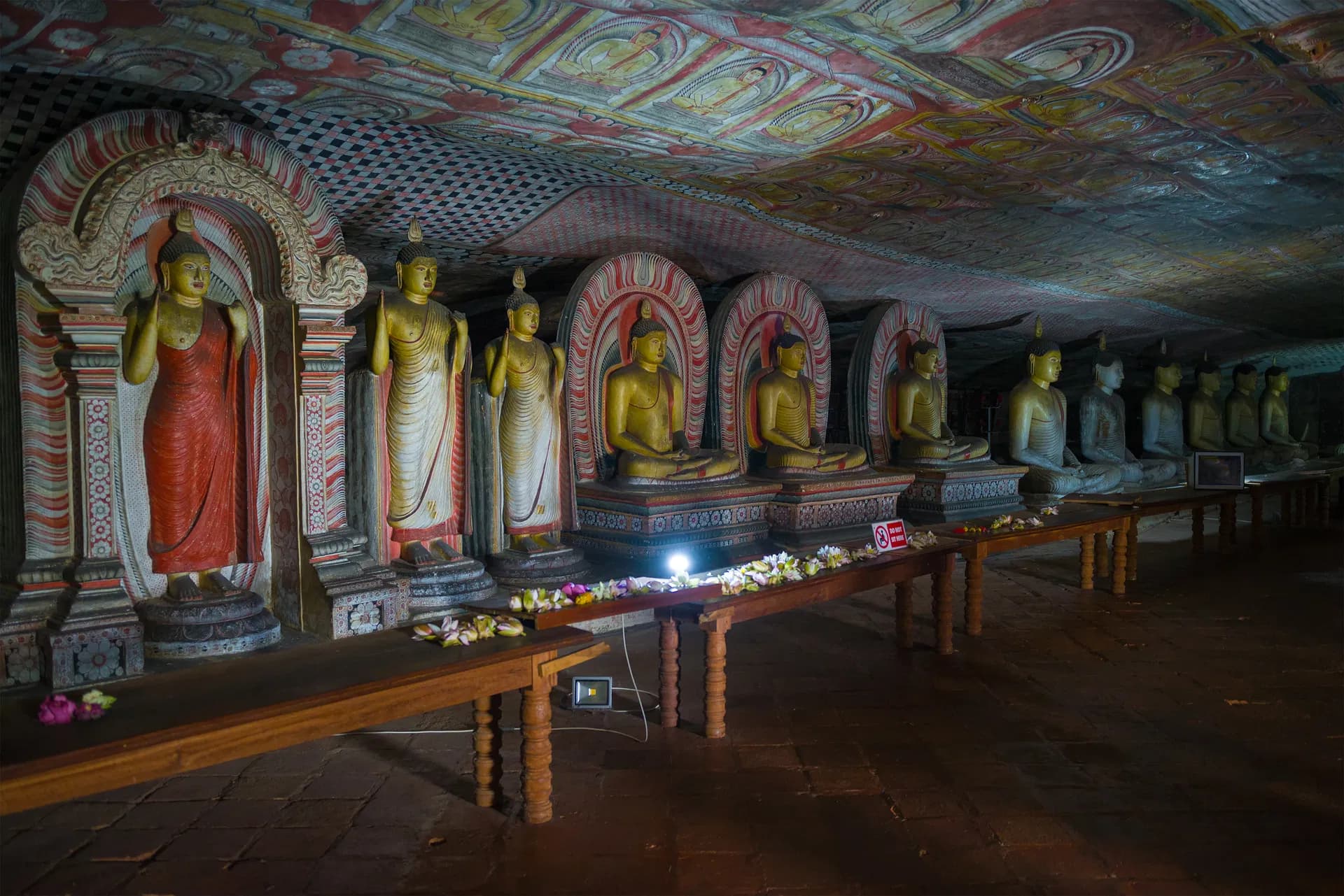 Buddha sculptures inside a cave temple