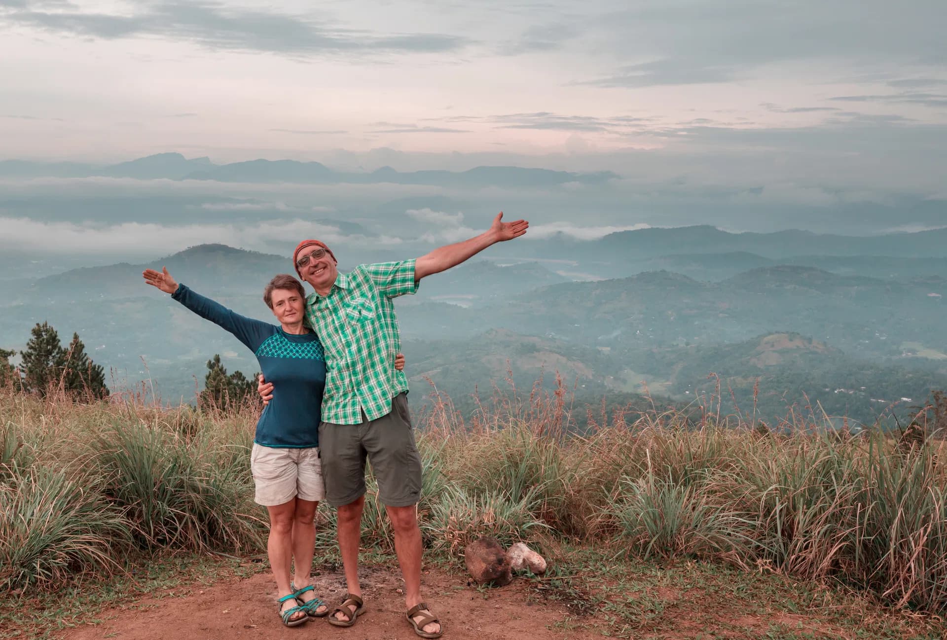 Couple posing at a mountain viewpoint in Ella