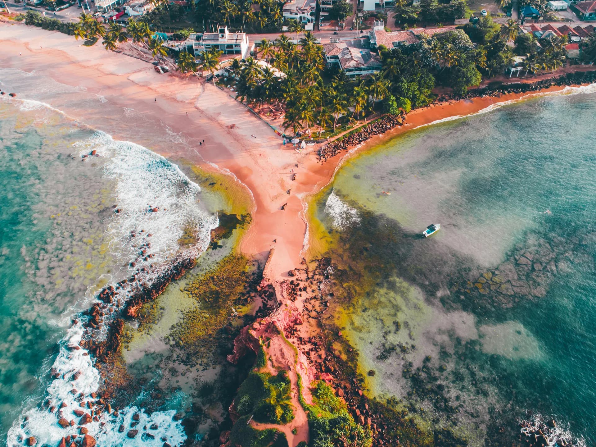 Aerial view of Mirissa town and coastline